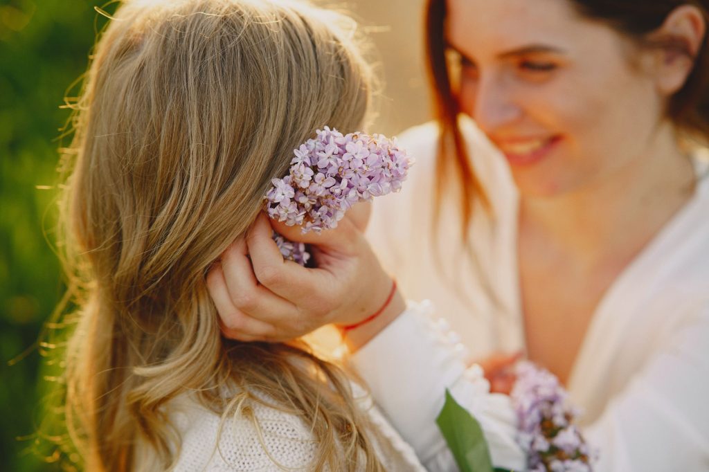 childhood upbringing flowers in hands memory of always being caregiver