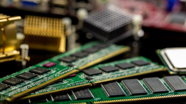 Detailed view of RAM sticks and microprocessors on a motherboard.
