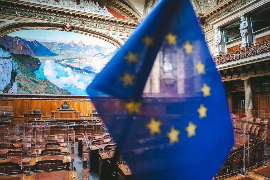European Union flag Brussels Council meeting room oil price cap discussion